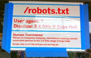 funny robots.txt sign at a conference
