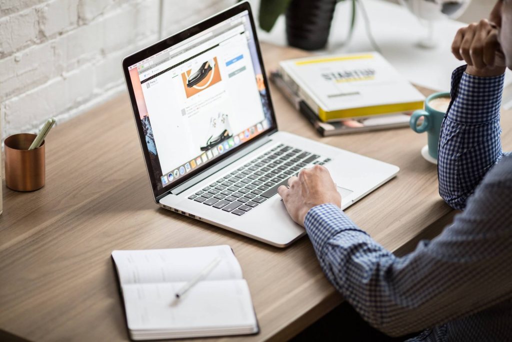 Person working on a laptop.