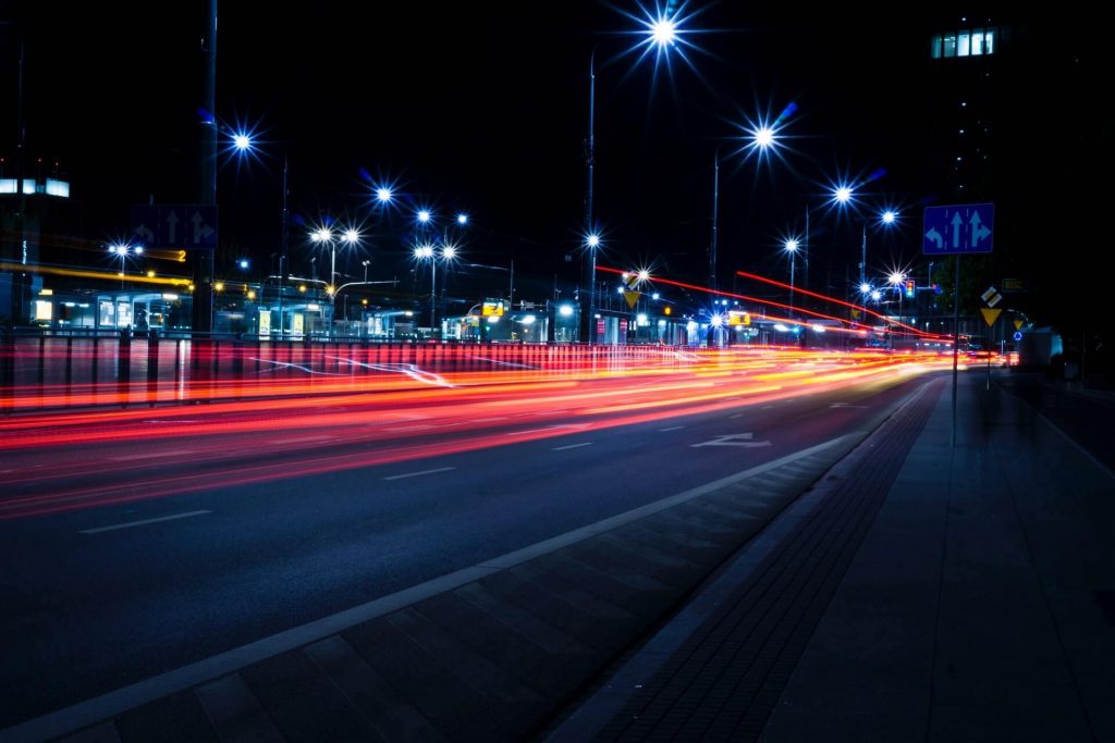 A time-lapse of cars driving down a street.