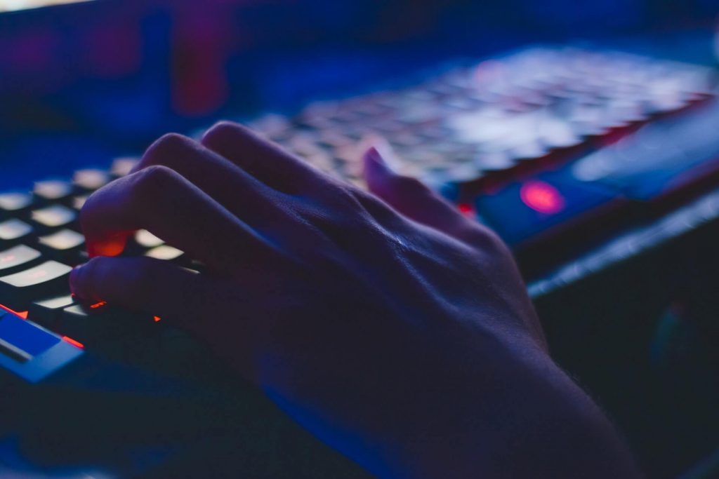 A keyboard in a dark room.