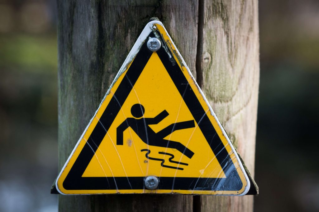 A yellow slip warning sign.