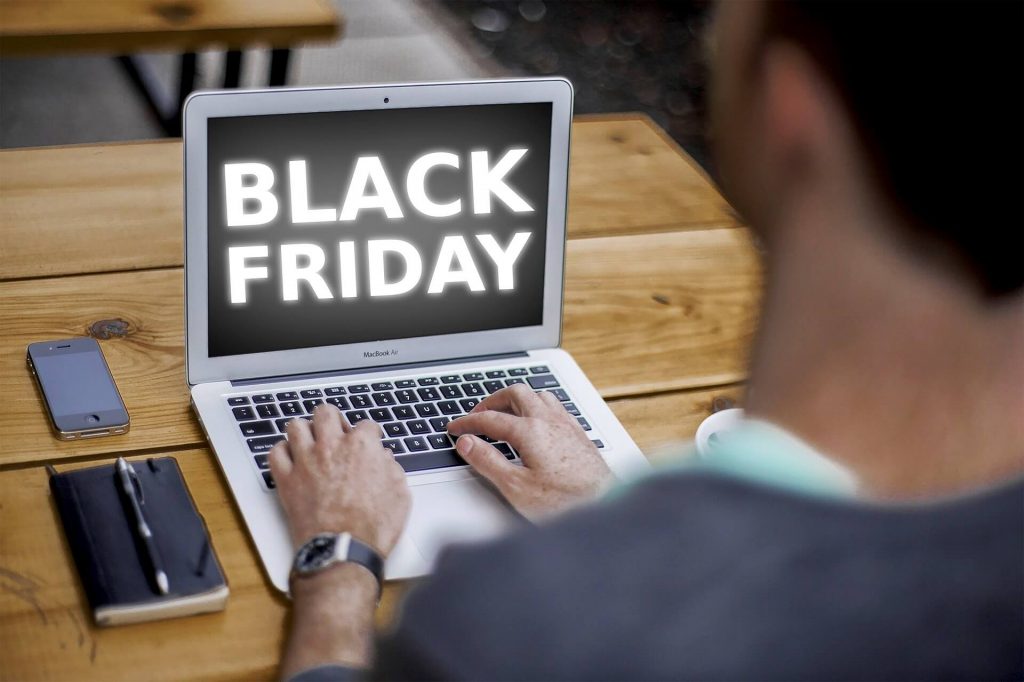 A laptop with a Black Friday sign
